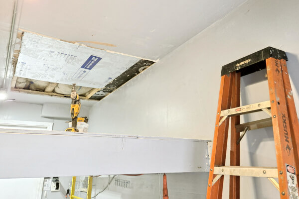 An unexpected water leak discovered in the garage ceiling during the final walkthrough of a South Elgin property sale.